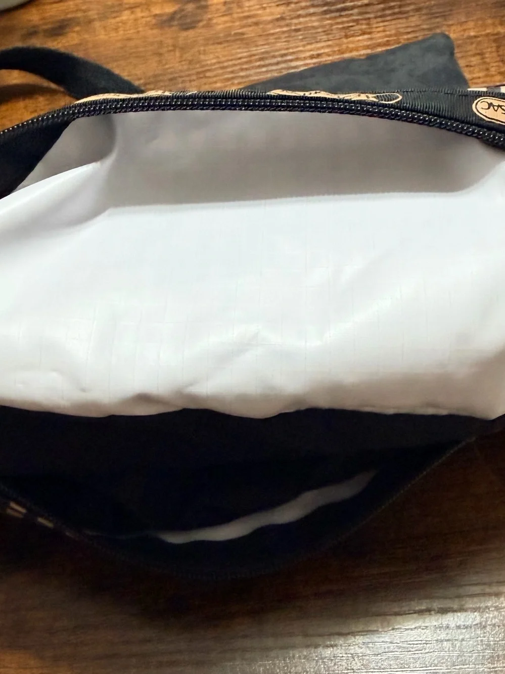 LeSportsac Black Cream Geometric Foldover Crossbody Purse